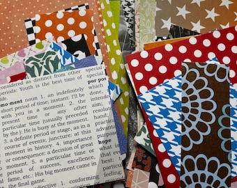 May include: A collection of patterned paper scraps in various colors and designs, including polka dots, stars, and floral patterns. Some pieces have text. The papers are bundled together in a clear plastic bag, ideal for crafting or scrapbooking projects.