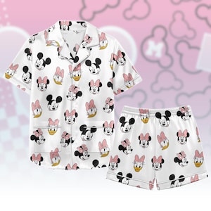 May include: A rustic wooden sign with the text "Welcome to our home" in white lettering. The sign features a distressed finish and a simple, inviting design, perfect for front door decor.