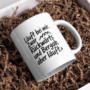 Funny coffee mug It runs backwards and downhill for me but it works saying mug gift for colleagues office home office humor mug