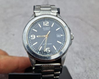 Casio 2784 mtp 1215 price discount