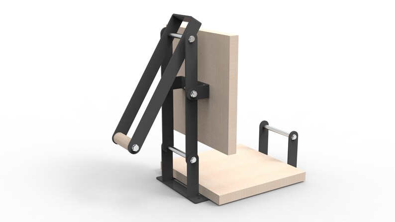 May include: A black and wood press with a light wood base and a vertical wood panel. The press has a lever arm with a wooden handle and is held together with silver bolts.