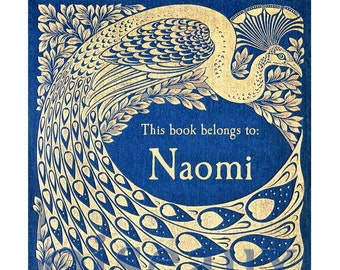 May include: A blue book cover with a gold peacock design. The text "This book belongs to: Naomi" is printed on the cover.
