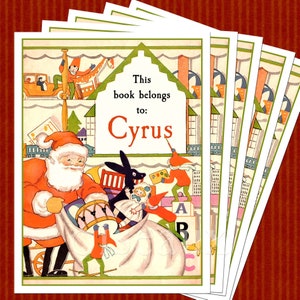 A bookplate featuring a charming vintage illustration of Santa and elves in his workshop. Toys fill the shelves behind them, 2 elves push toys into the sack, 1 stands on blocks and paints the name on a white dollhouse. Name is red, text black