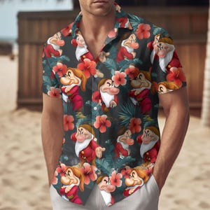 Könnte beinhalten: Ein Set aus drei Keramikbechern mit gesprenkelter, matter Oberfläche. Die Becher sind in Creme-, Hellgrau- und Dunkelgrautönen gehalten. Jeder Becher hat ein schlichtes, minimalistisches Design, ideal für Kaffee oder Tee.