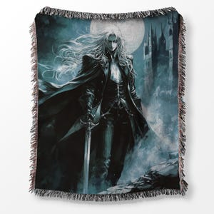 May include: A tapestry throw blanket featuring a dark-haired figure in a black coat and a sword, standing in front of a castle with a full moon in the background.