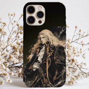 May include: A black phone case with a white and gold illustration of a man with long white hair. The man is wearing a black and gold jacket and has a serious expression on his face.