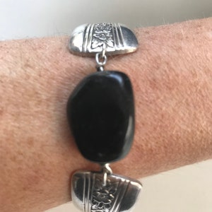 Silver recycled bracelet with center stone