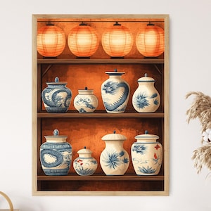May include: A framed print featuring a wooden shelf displaying various ceramic jars and lanterns. The jars are white with blue designs, including dragons and floral patterns. Above, four orange paper lanterns hang. The background is a warm orange hue.