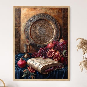 May include: A framed still life painting featuring a large, ornate, gold-colored plate, a chalice, and a book with script. Pomegranates and grapes are arranged on a blue cloth. The background has a textured, gold-toned appearance.