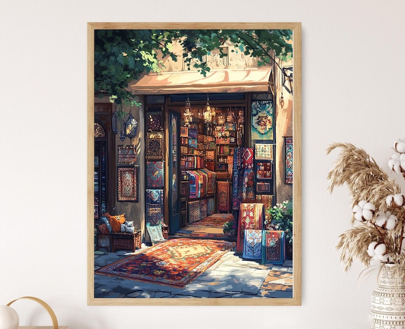 May include: A colorful shop front with a variety of rugs and textiles displayed in the window. The shop is located on a street with a tree overhead and a sunny sky.