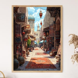 May include: A framed print depicting a vibrant Middle Eastern marketplace scene. The artwork showcases a bustling street lined with shops, colorful rugs, and hanging lanterns. A blue-domed structure is visible in the background, under a bright sky.