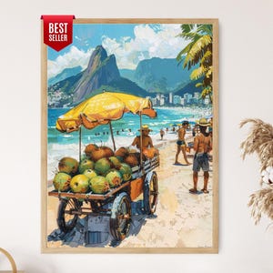 Puede incluir: Una impresión artística enmarcada representa una escena de playa con un vendedor de cocos. Un paraguas amarillo sombrea el carro lleno de cocos. El fondo muestra una montaña, el océano y edificios. Las palabras "Best Seller" están en la esquina superior izquierda.