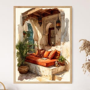 May include: Watercolor painting of an outdoor seating area with a red cushion, pillows, and potted plants. The scene includes a wooden frame, ornate lanterns, and architectural details, evoking a warm, inviting atmosphere. The artwork is framed.