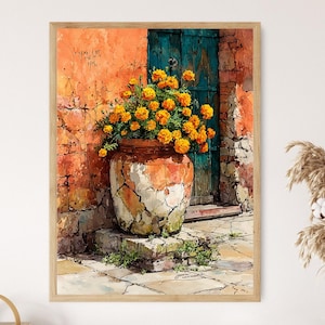 May include: A framed watercolor painting depicts a large, cracked terracotta pot overflowing with vibrant orange flowers. The pot sits on a stone base against an orange stucco wall and a teal door. The artwork evokes a warm, Mediterranean aesthetic.