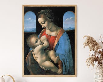 May include: A framed print of a Renaissance painting. The artwork depicts a woman in a red and blue robe holding a baby. The baby is reaching for the woman's breast. The background features arched windows with a landscape view.