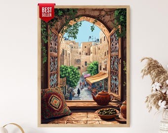 May include: A framed wall art print depicting an open arched window overlooking a stone-paved street market. A patterned cushion, a brown teapot, and a bowl of green olives sit on the windowsill. A red banner in the corner reads BEST SELLER.