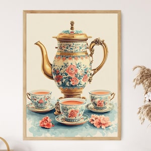 May include: A vintage-style teapot with floral designs in shades of blue, pink, and green, with a gold trim. The teapot is surrounded by three teacups with matching floral designs and filled with a light orange tea. The teacups are on white saucers with gold trim.
