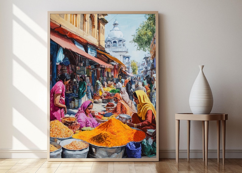 May include: A colorful painting depicting a bustling market scene in India. The painting features a variety of spices and other goods displayed in baskets and bowls. There are many people in the painting, some of whom are wearing traditional Indian clothing. The painting is set against a backdrop of colorful buildings and a blue sky.