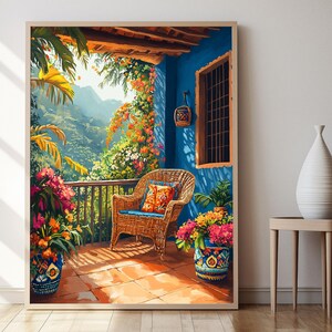 May include: A framed watercolor painting depicts a vibrant outdoor scene. A wicker chair with a blue cushion and patterned pillow sits on a tiled patio. Lush plants and flowers in decorative pots surround the patio, with a mountain view in the background.