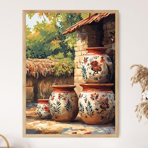 May include: A framed print depicting a painting of ceramic pots with floral and bird motifs. The pots are beige with red rims. The background shows a brick building, greenery, and a thatched roof, evoking a rustic scene.