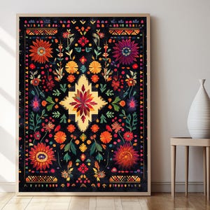 May include: A framed print of a colorful, intricate floral pattern on a black background. The design features a central starburst motif surrounded by various flowers and leaves.