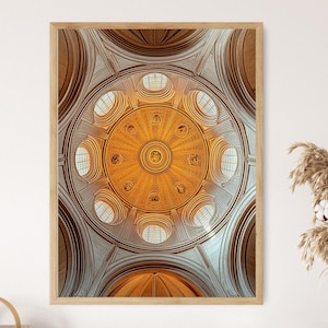 May include: A framed print of a cathedral ceiling. The image showcases a detailed, circular ceiling design with arched windows and intricate patterns. The color palette includes warm gold, brown, and white tones, creating a sense of grandeur and historical architecture.