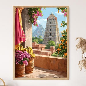 May include: A framed print of an Indian temple scene. The artwork depicts a tall, ornate temple with a white tower, set against a backdrop of mountains and a blue sky. The foreground features a balcony with potted flowers, a draped fabric, and a warm, inviting color palette.