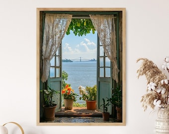 May include: A framed photograph of a window with white lace curtains, looking out onto a body of water with a bridge in the distance. There are potted plants on either side of the window.