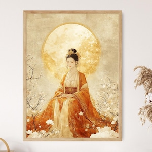 May include: A framed art print depicting a woman in traditional Asian dress, seated peacefully. The artwork uses a warm colour palette with orange, gold, and white tones. The background features a large golden circle and floral details.