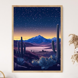 May include: A framed art print depicting a desert landscape under a starry night sky. The artwork features tall cacti, mountains, and a lake, with a color palette of blues, purples, and oranges. The print is in a wooden frame.