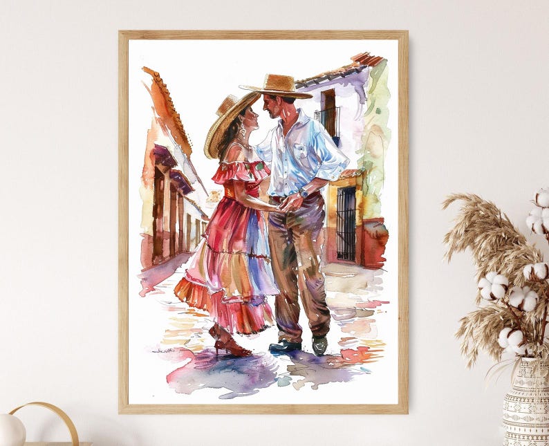 K&ouml;nnte beinhalten: Aquarellmalerei eines Paares in traditioneller Kleidung, das sich auf einer Kopfsteinpflasterstra&szlig;e umarmt. Die Frau tr&auml;gt ein rotes und mehrfarbiges Kleid und einen Strohhut. Der Mann tr&auml;gt ein wei&szlig;es Hemd, eine braune Hose und einen Strohhut. Das Kunstwerk ist in hellem Holz gerahmt.