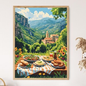 May include: A picnic scene with a table laid out with a selection of food, including a salad, bread, and a dish of hummus. The table is set on a chequered tablecloth and is surrounded by green grass and flowers. In the background, a picturesque village is nestled in a valley with mountains in the distance.