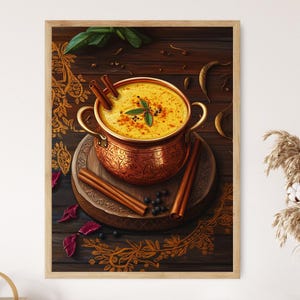 Può includere: Stampa incorniciata di una ciotola color rame piena di zuppa gialla, guarnita con foglie verdi e spezie. Bastoncini di cannella e grani di pepe circondano la ciotola su una superficie di legno. L'opera d'arte ha un'estetica calda.