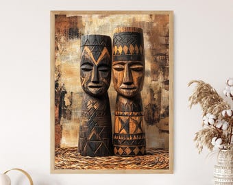 May include: A framed wall art print featuring two tall, cylindrical wooden sculptures with carved facial features and geometric patterns. The left sculpture is dark brown, while the right is a lighter tan. The background is a textured, abstract brown.