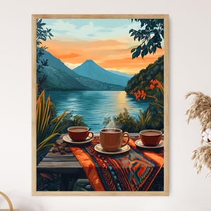 May include: A framed painting depicting a scenic landscape with a lake, mountains, and a sunset. Three mugs of hot chocolate are on a wooden table with a colourful patterned tablecloth in the foreground.