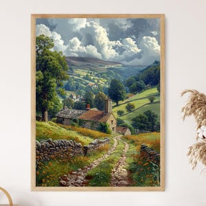 May include: A framed print of a rural landscape, featuring a stone cottage, a path, and rolling green hills under a cloudy sky. The artwork uses a warm colour palette with greens, browns, and yellows, creating a peaceful, natural scene. The print is in a wooden frame.