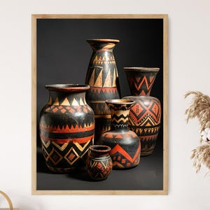 May include: A framed print featuring a collection of handcrafted ceramic vases. The vases are painted with black, orange, and yellow geometric patterns. The arrangement includes vases of various sizes, creating a visually appealing display.