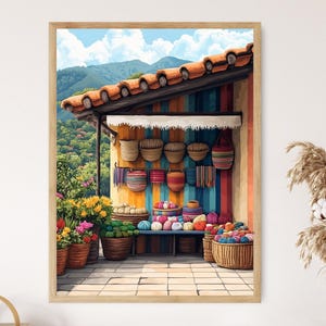 May include: Watercolor painting of a vibrant outdoor market stall. The stall features a colorful striped backdrop, displaying woven baskets, textiles, and colorful yarn. The scene is framed by a wooden structure with a terracotta tile roof, with mountains and blue sky in the background.