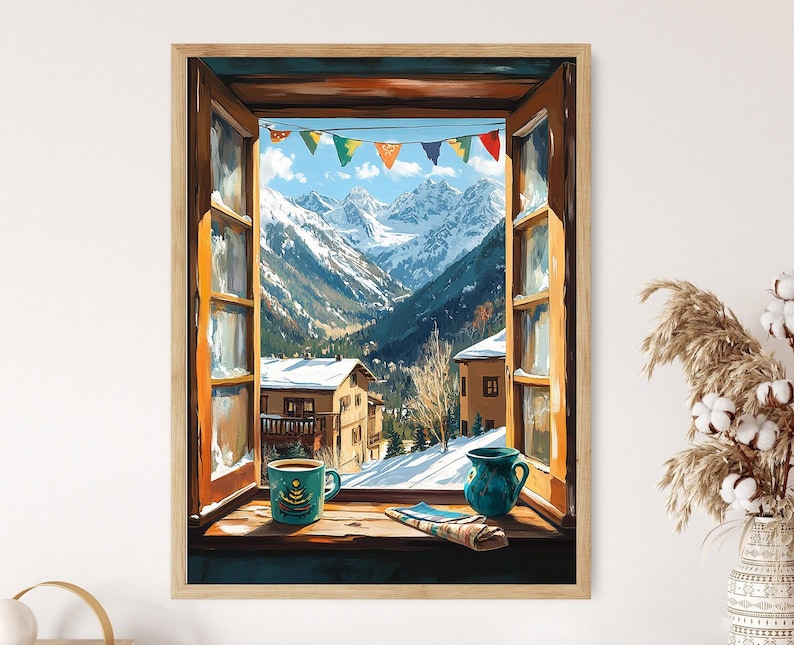 May include: A framed print of a winter landscape viewed through an open window. The scene includes snow-covered mountains, houses, and a colorful banner. A teal mug and pitcher sit on the windowsill. The artwork is in a wooden frame.
