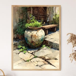 May include: Watercolor painting of a rustic outdoor scene. A large, weathered, cracked ceramic pot filled with greenery sits on a stone patio. A small wooden bench and a weathered wooden door are in the background. The artwork is framed in a light brown wooden frame.