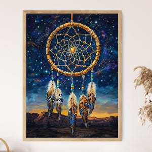 May include: A dreamcatcher with brown and gold feathers hangs against a dark blue background with white stars. The dreamcatcher has a beaded fringe and a woven web design.