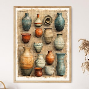 May include: A framed print featuring a collection of various ceramic vases in shades of blue, orange, and beige. The vases are arranged against a textured, neutral-toned background, creating a rustic and artistic display. The artwork is framed in a light-colored wooden frame.