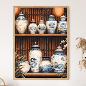 May include: A framed print showing a collection of blue and white ceramic vases and jars on wooden shelves. The vases feature floral and dragon patterns. The background includes bamboo and orange paper lanterns.