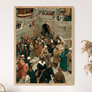 May include: A framed print of a historical scene depicting a large crowd of people in traditional attire gathered near a stone structure with an arched entrance. The artwork features muted tones and detailed figures.