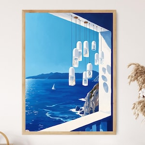 May include: A framed art print depicts a coastal scene with a bright blue sky and sea. White and clear pendant lights hang from the ceiling. A sailboat is visible on the water. The artwork is in a wooden frame.
