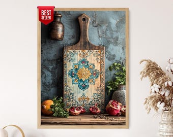 May include: A framed print featuring a wooden cutting board with a decorative floral design in teal and yellow. The image includes a small vase, a pumpkin, pomegranates, and greenery, creating a rustic kitchen theme. A "BEST SELLER" tag is in the upper left corner.