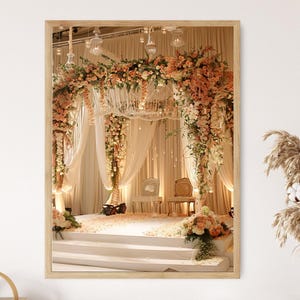 May include: A framed photograph of a wedding ceremony setup. The stage is decorated with flowers and draped with white fabric. The arch is adorned with peach and cream-colored flowers, and the stage has a scattering of petals.
