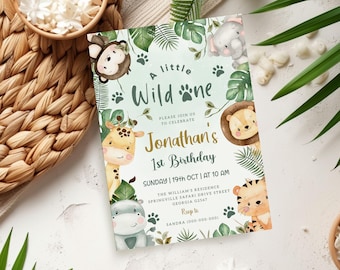 May include: A green and white invitation card with a jungle theme. It features a cute giraffe, monkey, elephant, lion, and tiger. The text reads "A little Wild One, Please join us to celebrate Jonathan's 1st Birthday, Sunday | 19th Oct | At 10 AM, The William's Residence, Springville Safari Drive Street, Georgia 02567, Rsvp to Sandra (000-000-000)"