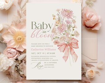 May include: Baby shower invitation with floral bouquet and a pink bow. The invitation reads "Baby in Bloom" and includes details for Catherine Williams' baby shower, including the date, time, and location.