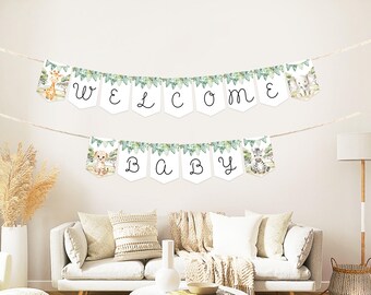 Puede incluir: Un cartel decorativo con las palabras "WELCOME BABY" en letras negras. El cartel presenta ilustraciones de una jirafa, un elefante, un guepardo y una cebra. Las banderolas blancas están decoradas con detalles de hojas verdes, ideal para un baby shower.